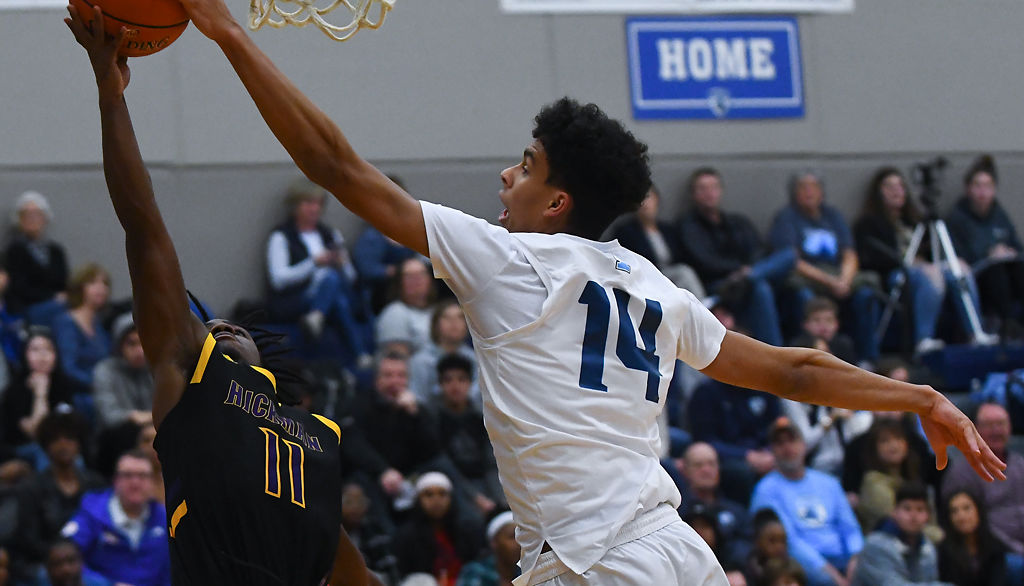 Jevon Porter blocks La'javion Williams